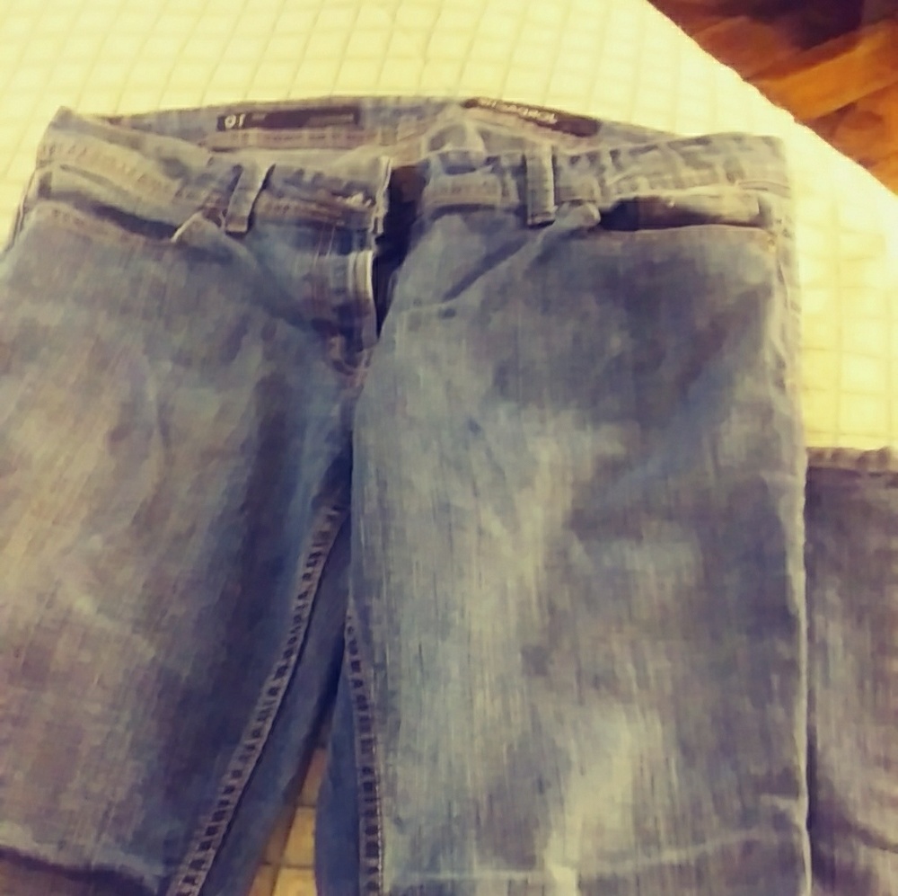 2 pairs of used boot cut jeans